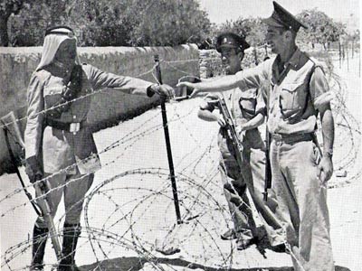 A Jordanian soldier and two Israeli policemen in Jerusalem, 1950.