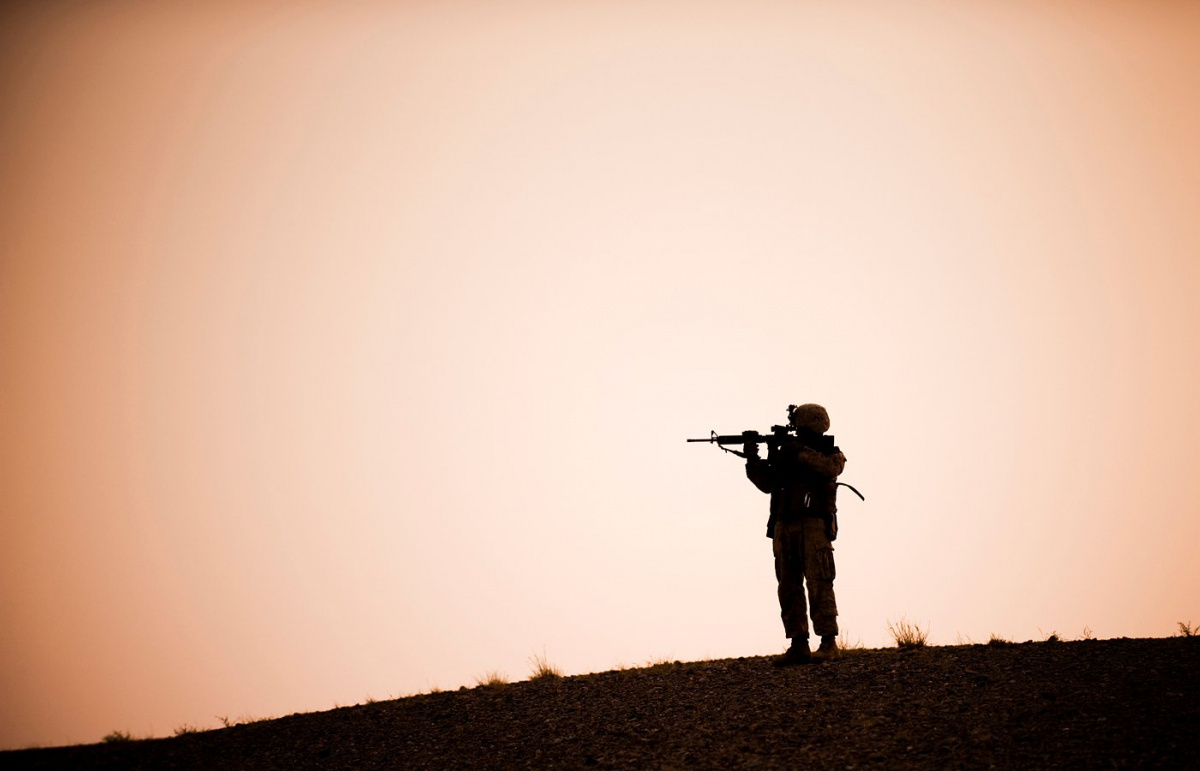 A Marine with Lima Company, 3rd Battalion, 3rd Marine Regiment scans the horizon at the start of a nine-hour night patrol in the Helmand province of Afghanistan. Flickr / U.S. Central Command
