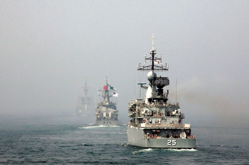 Naval frigates, (from R to L) Malaysia's KD Kasturi, Bangladesh's BNS Abu Bakar and Singapore's RSS Formidable, participate in multi-country maritime joint exercises off the coast in Qingdao, Shandong province April 23, 2014. The Chinese People's Liberation Army (PLA) Navy organized its first multilateral maritime exercises, dubbed "Maritime Cooperation - 2014", off the coast of the eastern Chinese city Qingdao on Wednesday, where 19 ships, seven helicopters and marine corps from eight countries including C
