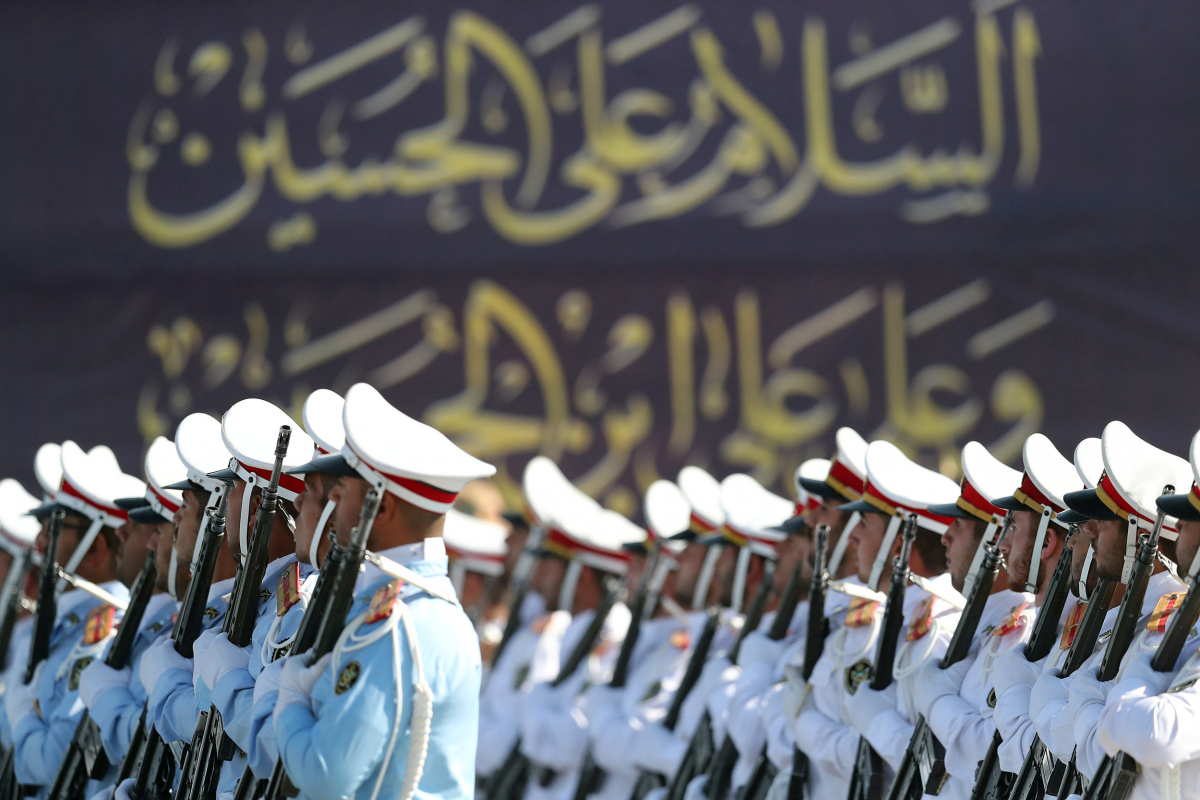 Members of Iranian armed forces march during a parade in Tehran