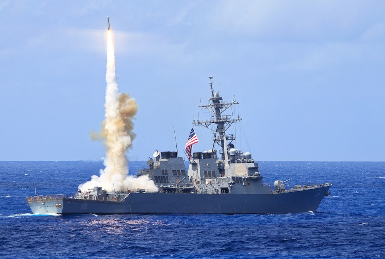 Arleigh Burke–class guided-missile destroyer USS Curtis Wilbur during a missile firing exercise​. Flickr/DVIDSHUB