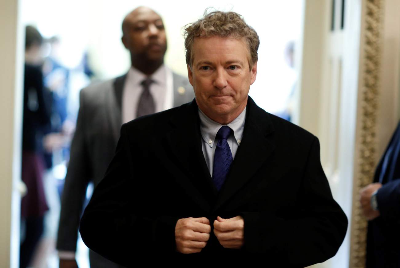 Senator Rand Paul (R-KY) walks from Senate Republican weekly policy luncheon on Capitol Hill in Washington