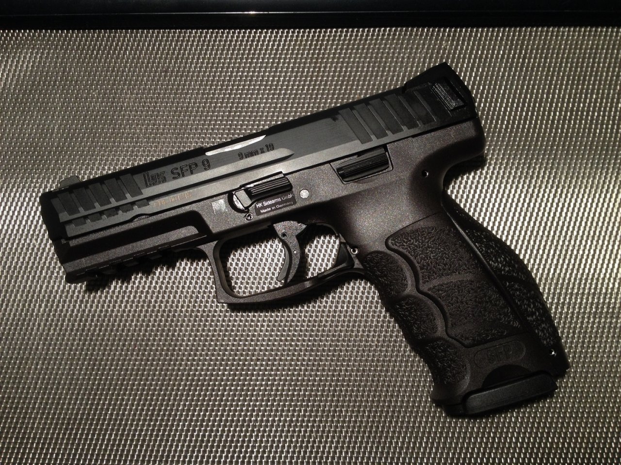 Meet The 5 Best 9mm Handguns And Hunting Rifles On The Planet The   HK SFP9 LSH.JPG