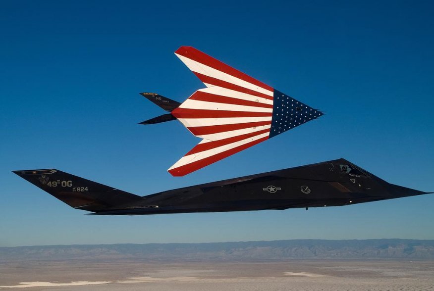Two specially painted F-117 Nighthawks fly on one of their last missions. The F-117s were retired in a farewell ceremony at Wright-Patterson Air Force Base, Ohio, April 22, 2008. (U.S. Air Force photo by Senior Master Sgt. Kim Frey)