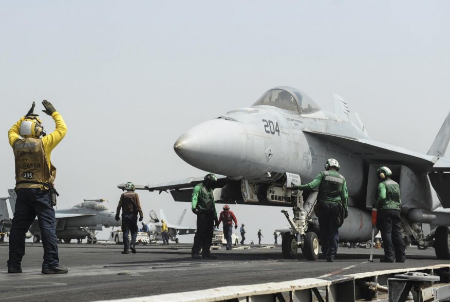 An F/A-18E Super Hornet prepares to launch from the flight deck of the aircraft carrier USS Nimitz in this U.S. Navy handout taken in the Red Sea in this September 3, 2013 handout from the U.S. Navy. Mass Communication Specialist 3rd Class Nathan R. McDon