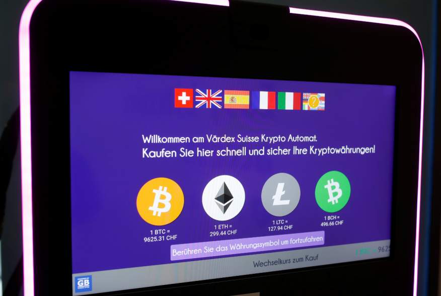 The exchange rates and logos of Bitcoin (BTH), Ether (ETH), Litecoin (LTC) and Bitcoin Cash (BCH) are seen on the display of a cryptocurrency ATM of blockchain payment service provider Vaerdex at the headquarters of Swiss Falcon Private Bank in Zurich, Sw