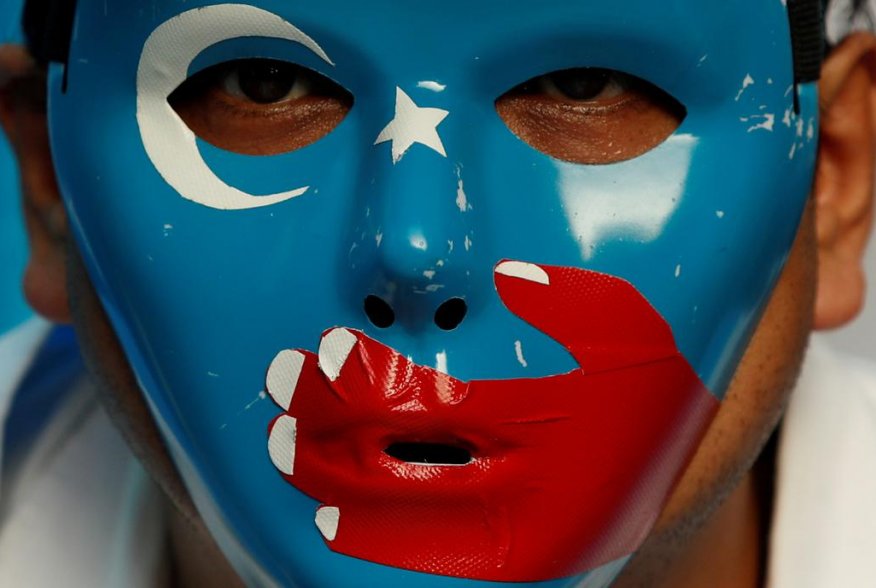 A Chinese Uyghur Muslim participates in an anti-China protest during the G20 leaders summit in Osaka, Japan June 28, 2019. REUTERS/Jorge Silva