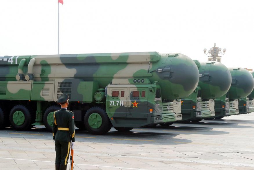 Military vehicles carrying DF-41 intercontinental ballistic missiles travel past Tiananmen Square during the military parade marking the 70th founding anniversary of People's Republic of China, on its National Day in Beijing, China October 1, 2019. REUTER