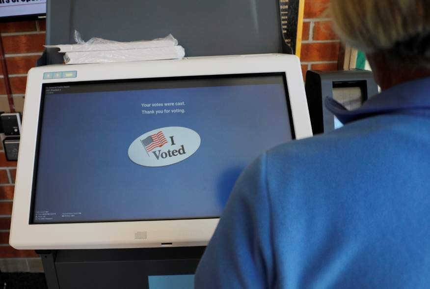 The screen reads "I Voted" after a voter went through a practice session with the new Election Systems & Software ExpressVote XL voting machine, an electronic voting system with a backup paper trail, in Hanover Township, Pennsylvania, U.S.,