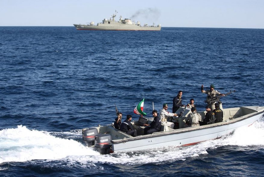 Iranian marine soldiers wave to the camera from a motor boat in the Sea of Oman during the third day of joint Iran, Russia and China naval war games in Chabahar port, at the Sea of Oman, Iran, December 29, 2019. Mohsen Ataei/Fars news agency/WANA (West As