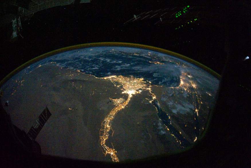 A NASA satellite image, taken by one of the Expedition 25 crew members on the International Space Station, shows the lights of Cairo, Alexandria and the Nile River, Egypt October 28, 2010. Picture taken October 28, 2010. NASA/Handout via REUTERS
