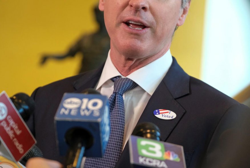 California's Governor Gavin Newsom wears an ?I Voted? sticker as he speaks to the media after casting his ballot at a voting center at The California Museum, during the presidential primaries on Super Tuesday in Sacramento, CA U.S., March 3, 2020. REUTERS