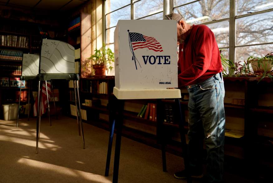 Percy C Wade III fills out his ballot at the Weleetka school library on Super Tuesday in Weleetka, Oklahoma, U.S., March 3, 2020. REUTERS/Nick Oxford