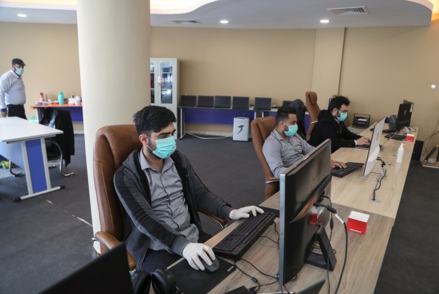 School media department staff are editing online classes, following the outbreak of the coronavirus disease (COVID-19) in the holy city of Karbala, Iraq March 26, 2020. REUTERS/Abdullah Dhiaa Al-Deen