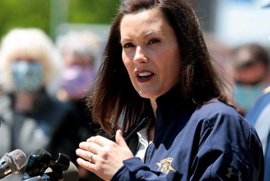 Michigan Governor Gretchen Whitmer addresses the media about the flooding along the Tittabawassee River, after several dams breached, in downtown Midland, Michigan, U.S., May 20, 2020. REUTERS/Rebecca Cook