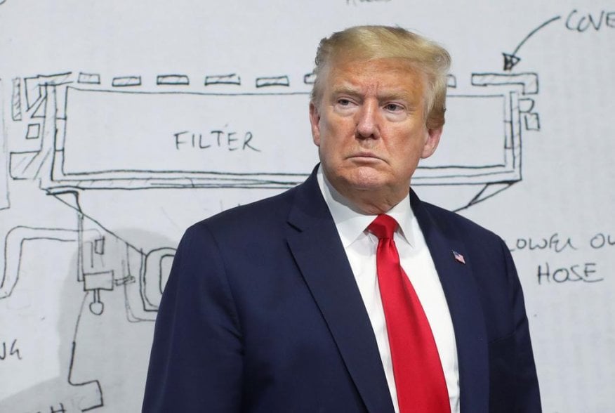 U.S. President Donald Trump pauses in front of a diagram while touring the Ford Rawsonville Components Plant, which is making ventilators and medical supplies, during the coronavirus disease (COVID-19) pandemic in Ypsilanti, Michigan, U.S., May 21, 2020. 