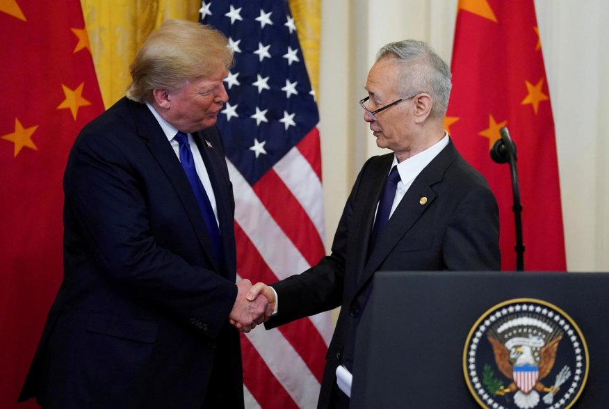 U.S. President Donald Trump shakes hands with Chinese Vice Premier Liu He during a signing ceremony for "phase one" of the U.S.-China trade agreement in the East Room of the White House in Washington, U.S., January 15, 2020. REUTERS/Kevin Lamarque