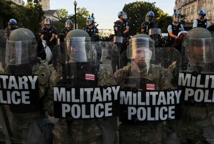 DC National Guard Military Police officers and law enforcement officers stand guard during a protests against the death in Minneapolis custody of George Floyd, near the White House in Washington, D.C., U.S., June 1, 2020. REUTERS/Jonathan Ernst