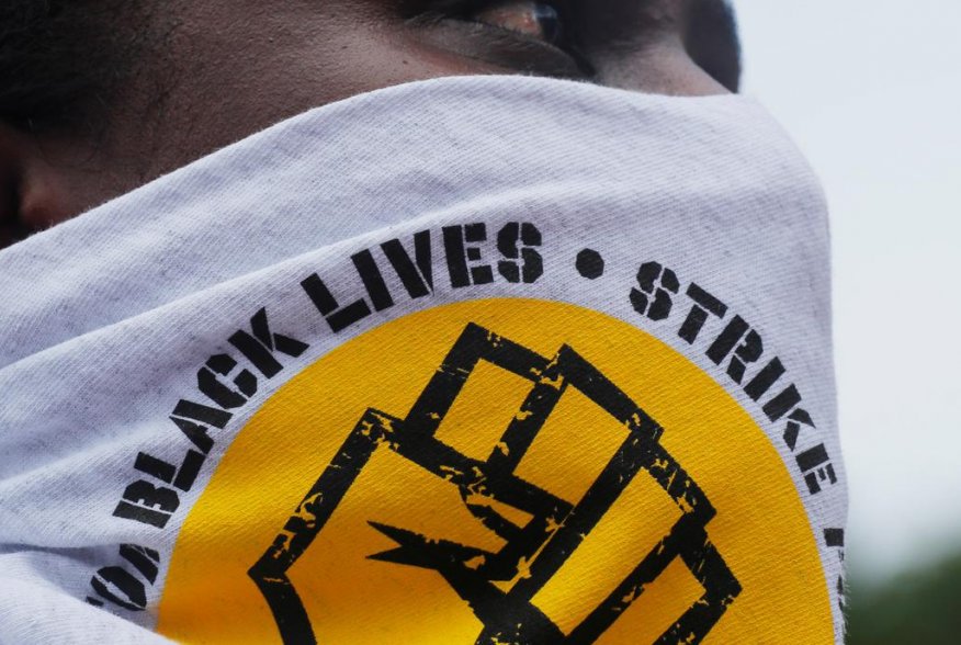 SEIU 32BJ union worker Dalida Rocha takes part in a nationwide Strike for Black Lives, protesting against racial inequality in the aftermath of the death in Minneapolis police custody of George Floyd, in Boston, Massachusetts, U.S., July 20, 2020. REUTERS