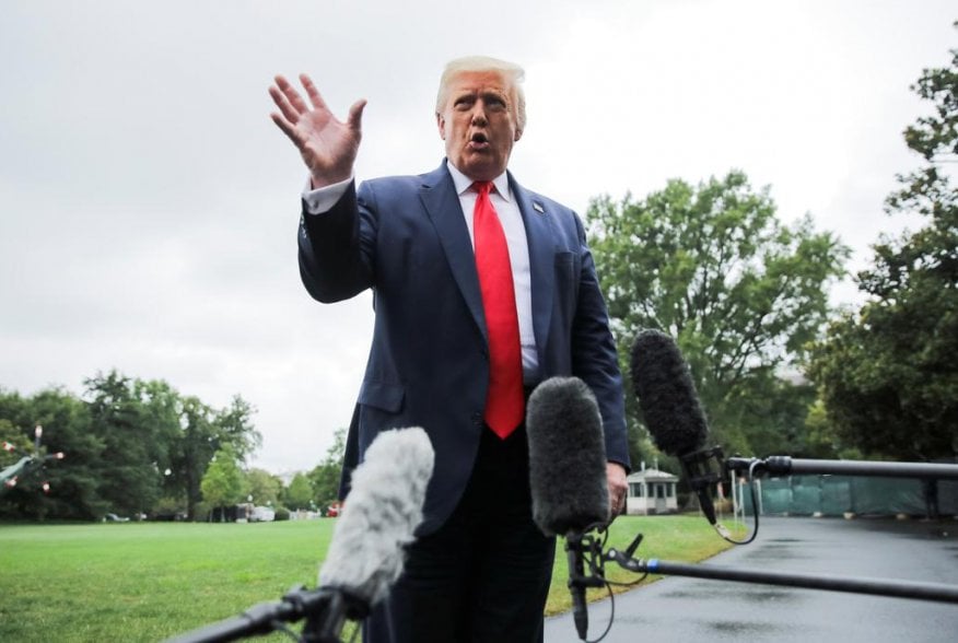 U.S. President Donald Trump speaks to reporters as he departs for a trip to Florida from the South Lawn of the White House in Washington, U.S., July 31, 2020. REUTERS/Carlos Barria