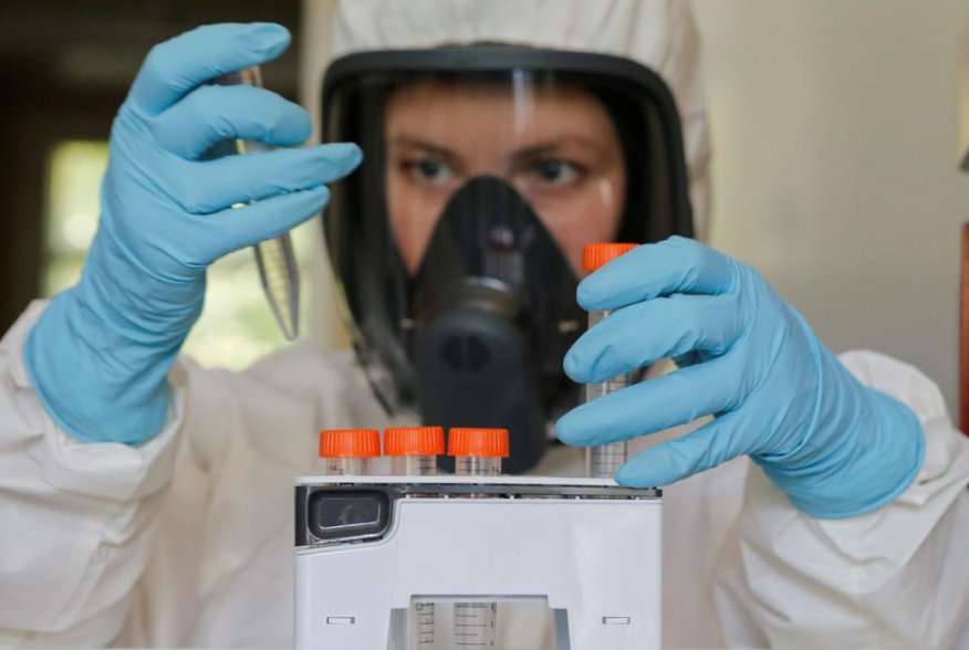 A scientist works inside a laboratory of the Gamaleya Research Institute of Epidemiology and Microbiology during the production and laboratory testing of a vaccine against the coronavirus disease (COVID-19), in Moscow, Russia August 6, 2020. Picture taken
