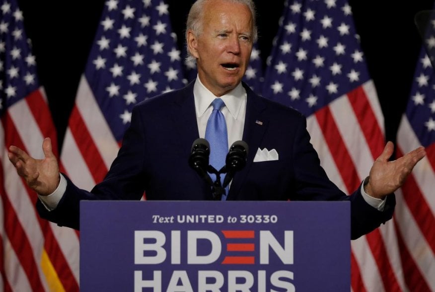 Democratic presidential candidate and former Vice President Joe Biden gestures as he speaks at a campaign event, on his first joint appearance with Vice presidential candidate Senator Kamala Harris after being named his running mate, at Alexis Dupont High