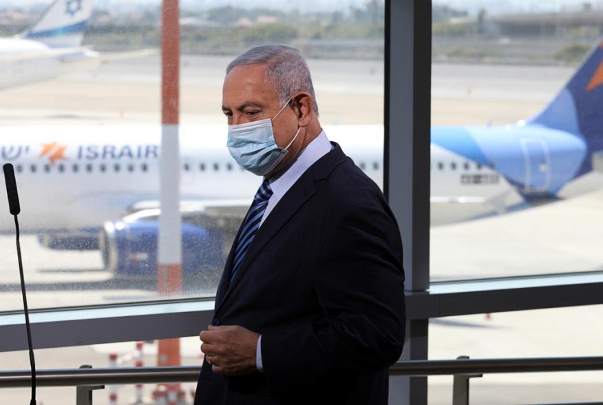 Israeli Prime Minister Benjamin Netanyahu prepares to give a statement at Ben Gurion International Airport, in Lod, near Tel Aviv, Israel August 17, 2020. Emil Salman/Pool via REUTERS