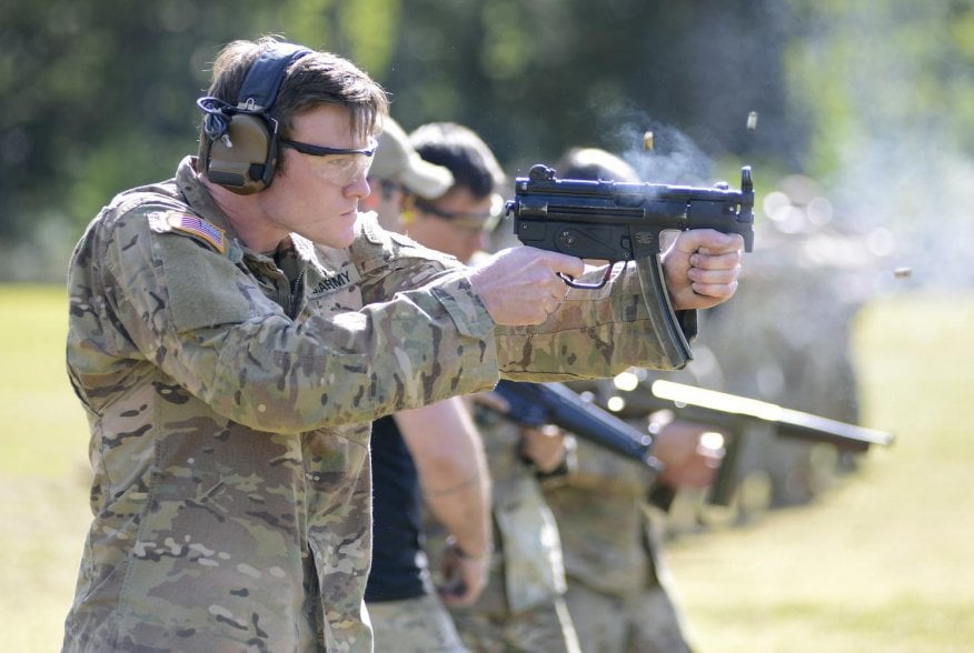 A student assigned to the U. S. Army John F. Kennedy Special Warfare Center and School who is in the Special Forces Weapons Sergeant Course fires an MP5K submachine gun during weapons training at Fort Bragg, North Carolina May 12, 2020. 