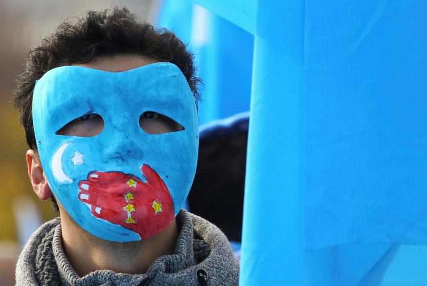 A man takes part in a demonstration against China during its Universal Periodic Review by the Human Rights Council in front of the United Nations Office in Geneva, Switzerland, November 6, 2018. REUTERS/Denis Balibouse
