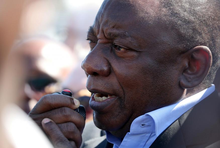 FILE PHOTO: South African President Cyril Ramaphosa speaks during a visit to crime ridden Hanover Park township to launch a new Anti-Gang Unit, in Cape Town, South Africa November 2, 2018. REUTERS/Mike Hutchings/File Photo