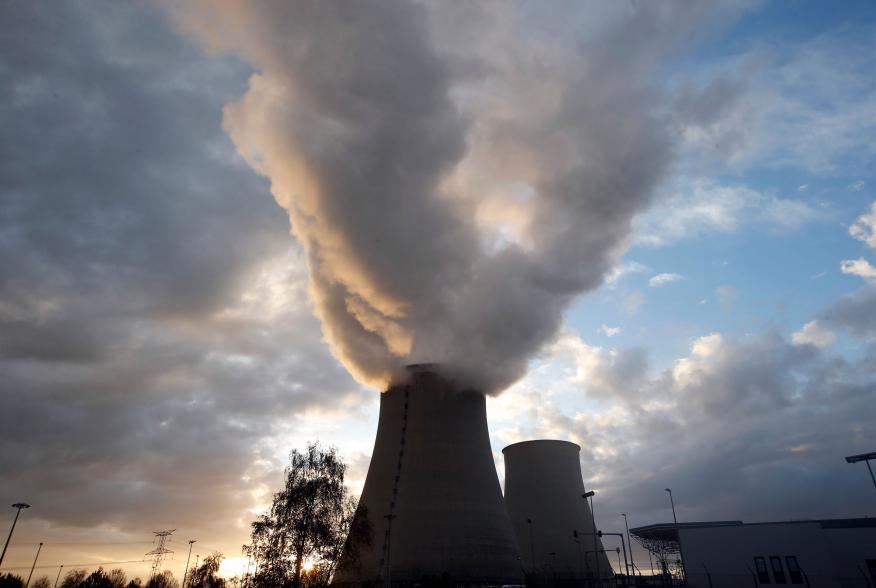 Steam rises at sunset from the cooling towers of the Electricite de France (EDF) nuclear power station at Nogent-Sur-Seine, France, November 13, 2015. The nuclear industry argues world leaders at the COP21 conference in Paris next week should not have to 