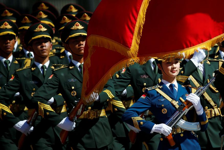 Honour guards march during a welcoming ceremony attended by Chinese Premier Li Keqiang and Canadian Prime Minister Justin Trudeau (not pictured) at the Great Hall of the People in Beijing, China, August 31, 2016. REUTERS/Thomas Peter