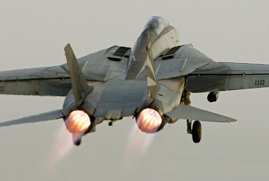 An F-14 Tomcat fighter jet takes off from the USS Kitty Hawk aircraft carrier in the northern Gulf April 9, 2003.