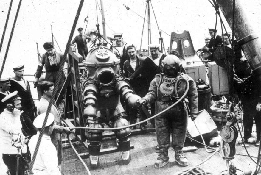 J. Peress' 1-atm dive suit, Tritonia, explored the Lusitania wreck in 1935. Jim Jarrett was Peress's chief diver and made this dive to 312 feet. This suit was a precursor to the "Jim" suit, named for Jim Jarrett.