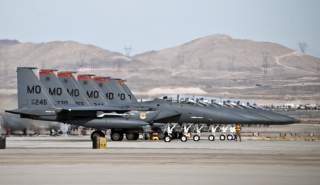 Seven F-15E Strike Eagles assigned to the 391st Fighter Squadron, Mountain Home Air Force Base, Idaho, taxi into position for an end-of-runway inspection prior to a Red Flag 14-1 training mission Jan. 29, 2014, at Nellis AFB Nev. Air force