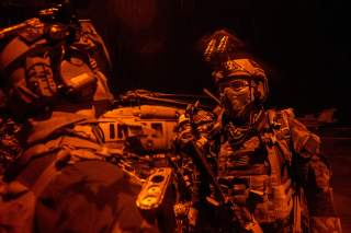 PACIFIC OCEAN (Sept. 28, 2014) Maritime special operations forces prepare for a mission during a training exercise aboard the Nimitz-class aircraft carrier USS George Washington (CVN 73). National Museum of the U.S. Navy. 28 September 2014.