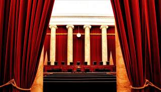The inside of the United States Supreme Court. In the photo are the nine chairs of the Supreme Court Justices.