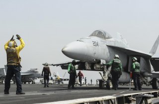 An F/A-18E Super Hornet prepares to launch from the flight deck of the aircraft carrier USS Nimitz in this U.S. Navy handout taken in the Red Sea in this September 3, 2013 handout from the U.S. Navy. Mass Communication Specialist 3rd Class Nathan R. McDon