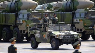 Military vehicles carrying DF-21D ballistic missiles roll to Tiananmen Square during a military parade to mark the 70th anniversary of the end of World War Two, in Beijing, China, September 3, 2015. REUTERS/Damir Sagolj