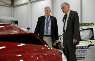 Consumer auto safety advocate Ralph Nader (R) looks over a 2015 Nissan Tsuru (red) after a controlled crash test with a 2016 Nissan Versa at the Insurance Institute for Highway Safety facility in Ruckersville, Virginia U.S., October 27, 2016. REUTERS/Gary