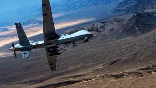 An MQ-9 Reaper remotely piloted drone aircraft performs aerial maneuvers over Creech Air Force Base, Nevada, U.S., June 25, 2015. Picture taken June 25, 2015. U.S. Air Force/Senior Airman Cory D. Payne/Handout