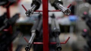 The barrels of AR-15 rifles are displayed for sale at the Guntoberfest gun show in Oaks, Pennsylvania, U.S., October 6, 2017. REUTERS/Joshua Roberts