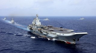 China's aircraft carrier Liaoning takes part in a military drill of Chinese People's Liberation Army (PLA) Navy in the western Pacific Ocean, April 18, 2018. Picture taken April 18, 2018. REUTERS/Stringer 