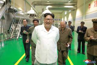 North Korea leader Kim Jong Un inspects a factory producing potato powders in Samjiyon County in this undated photo released by North Korea's Korean Central News Agency (KCNA) on July 10, 2018. KCNA/via REUTERS