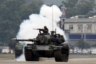 A 584th armored brigade's CM-11 Brave Tiger tank takes part in anti-invasion drill, simulating the China's People's Liberation Army (PLA) invading the island, in Taoyuan, Taiwan October 9, 2018. REUTERS/Tyrone Siu