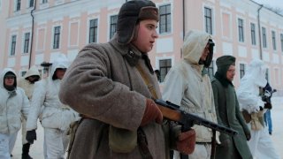 Enthusiasts dressed in historical World War II uniforms and depicting prisoners of war, participate in historical reconstruction, to mark the 75th anniversary of the liberation of Veliky Novgorod from Nazi occupation in Veliky Novgorod, Russia January 20,