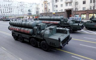 Russian servicemen sit in the cabins of S-400 missile air defence systems in Tverskaya Street before a rehearsal for the Victory Day parade, which marks the anniversary of the victory over Nazi Germany in World War Two, in central Moscow, Russia April 29,