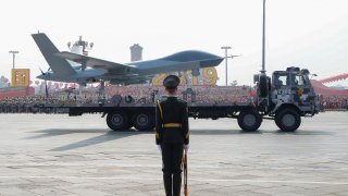 A military vehicle carrying an unmanned aerial vehicle (UVA) travels past Tiananmen Square during the military parade marking the 70th founding anniversary of People's Republic ofChina, on its National Day in Beijing, China October 1, 2019. REUTERS/Thomas