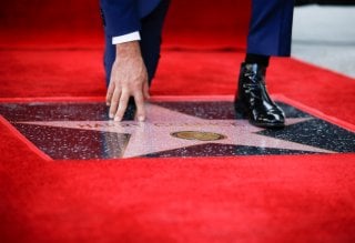 Entertainer Harry Connick Jr. touches his star during his Hollywood Walk of Fame star ceremony in Los Angeles, California, U.S., October 24, 2019. REUTERS/Danny Moloshok