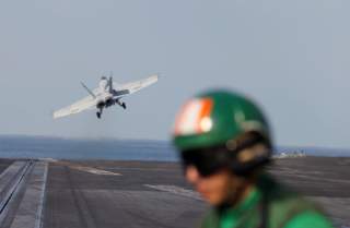 An EA-18E Super Hornet is catapulted off from the flight deck of the aircraft carrier USS Abraham Lincoln (CVN 72) in the Gulf, November 23, 2019. REUTERS/Hamad I Mohammed